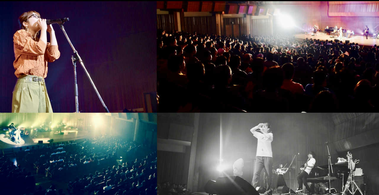 民謡やPOPSを満員の会場で歌う朝倉さやの写真